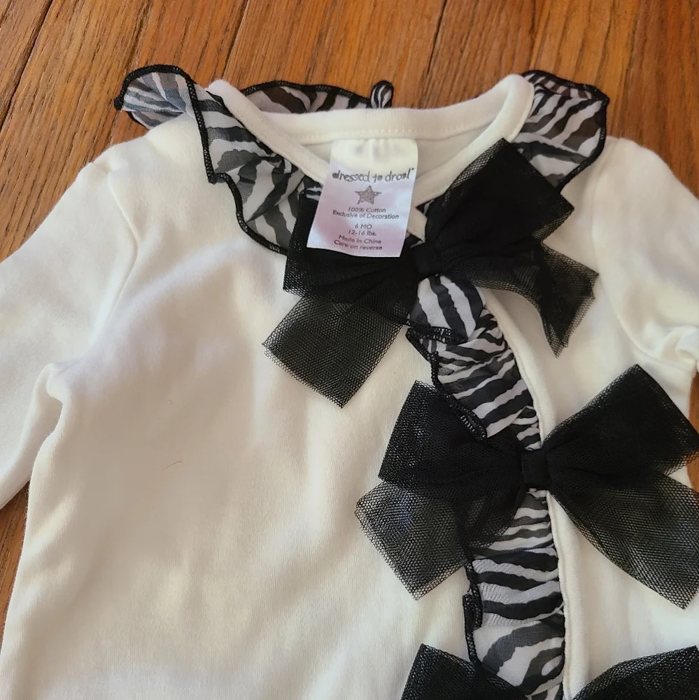 dressed to drool 6 months black and white romper with bows